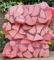 Netted Sacks Logs Netted Bagged Logs Petersfield Logs & Coal Firewood Bulk Bags Logs Sheet Liss Hawkley Rake Milland Rogate Nyewood Froxfield Langrish Harting Buriton Liphook